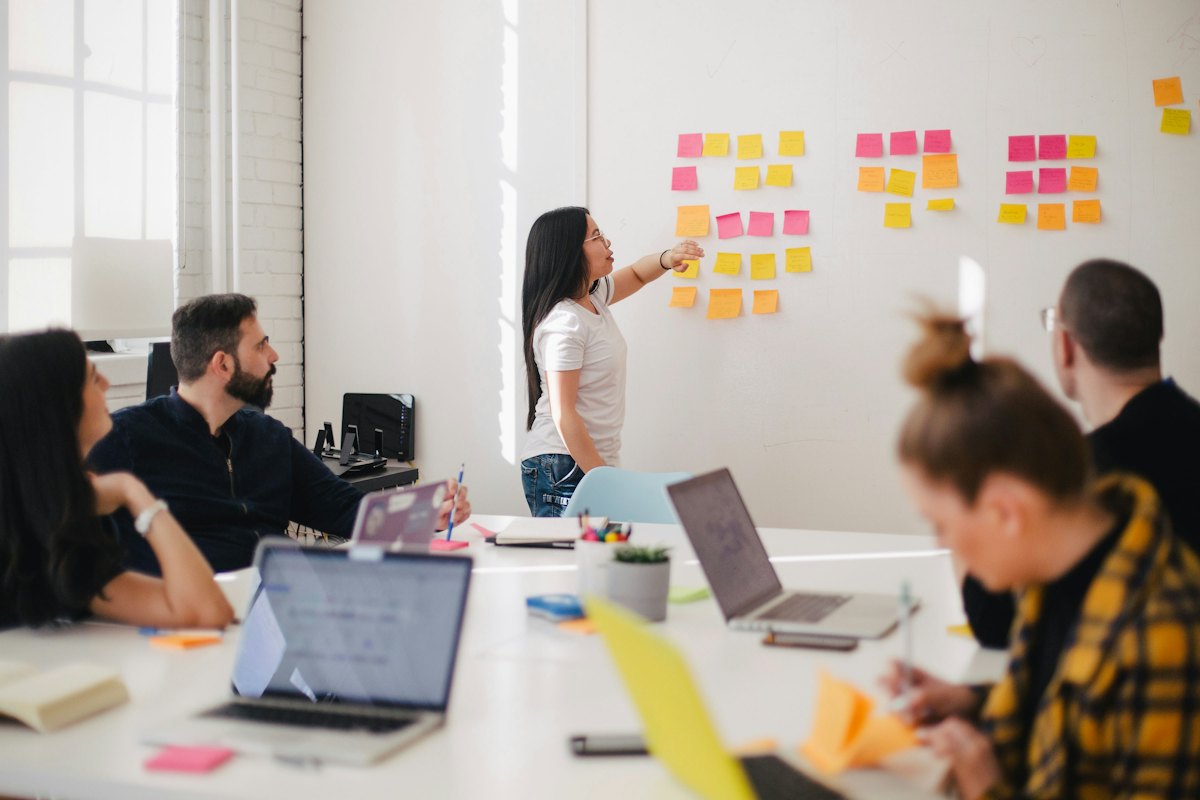 Sales team reviewing CRM pipeline on screen